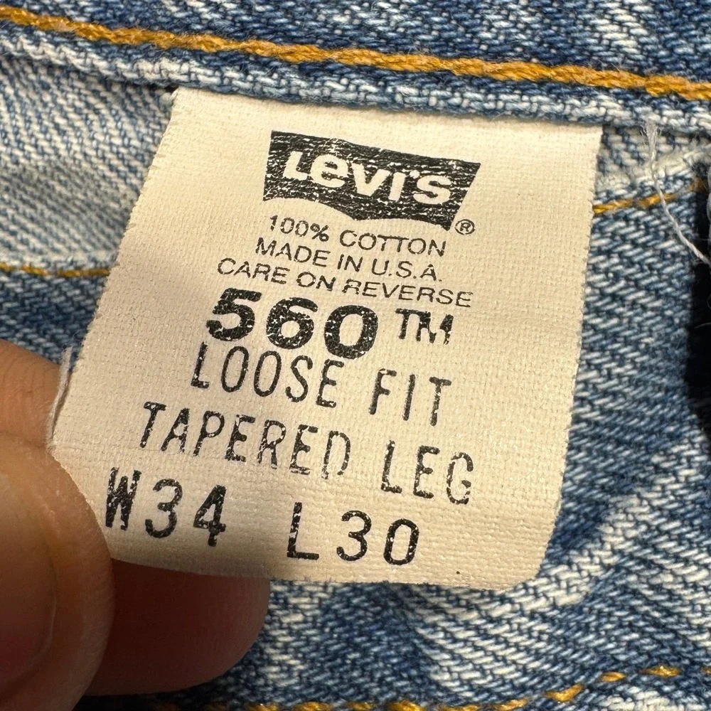 VTG Levis 560 Jeans Mens 34x30 Blue Relaxed Tapered Light Wash Made In USA Bat‎